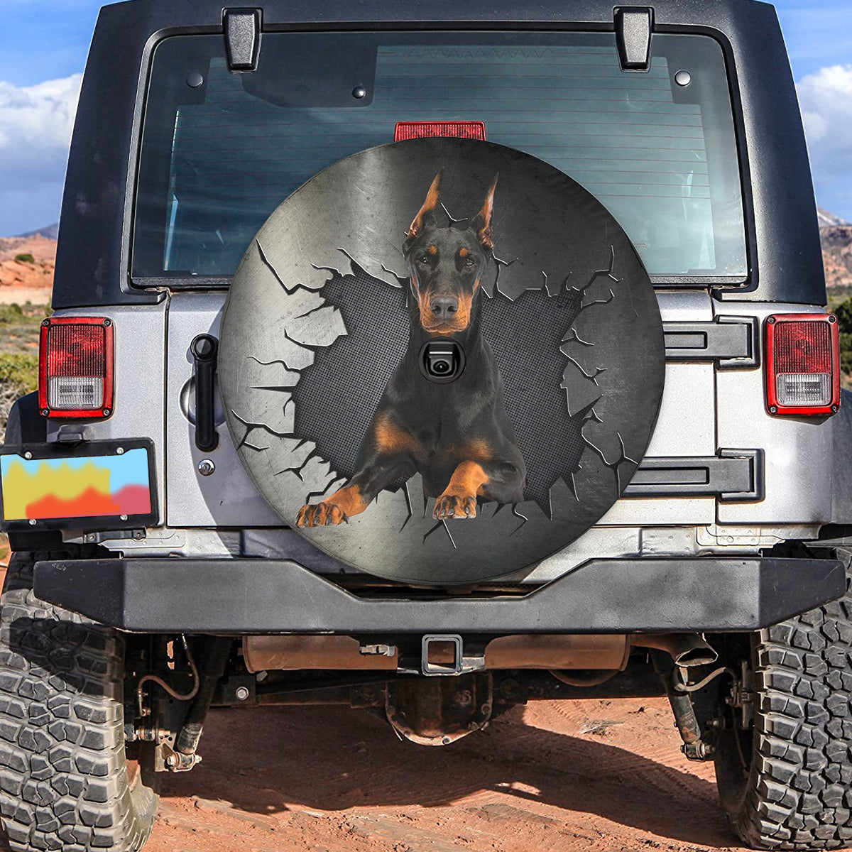 Petthouse | Doberman Pinscher Peeking Out Metal Cracked Wheel Cover Universal Fit Pet Paw Car Accessories